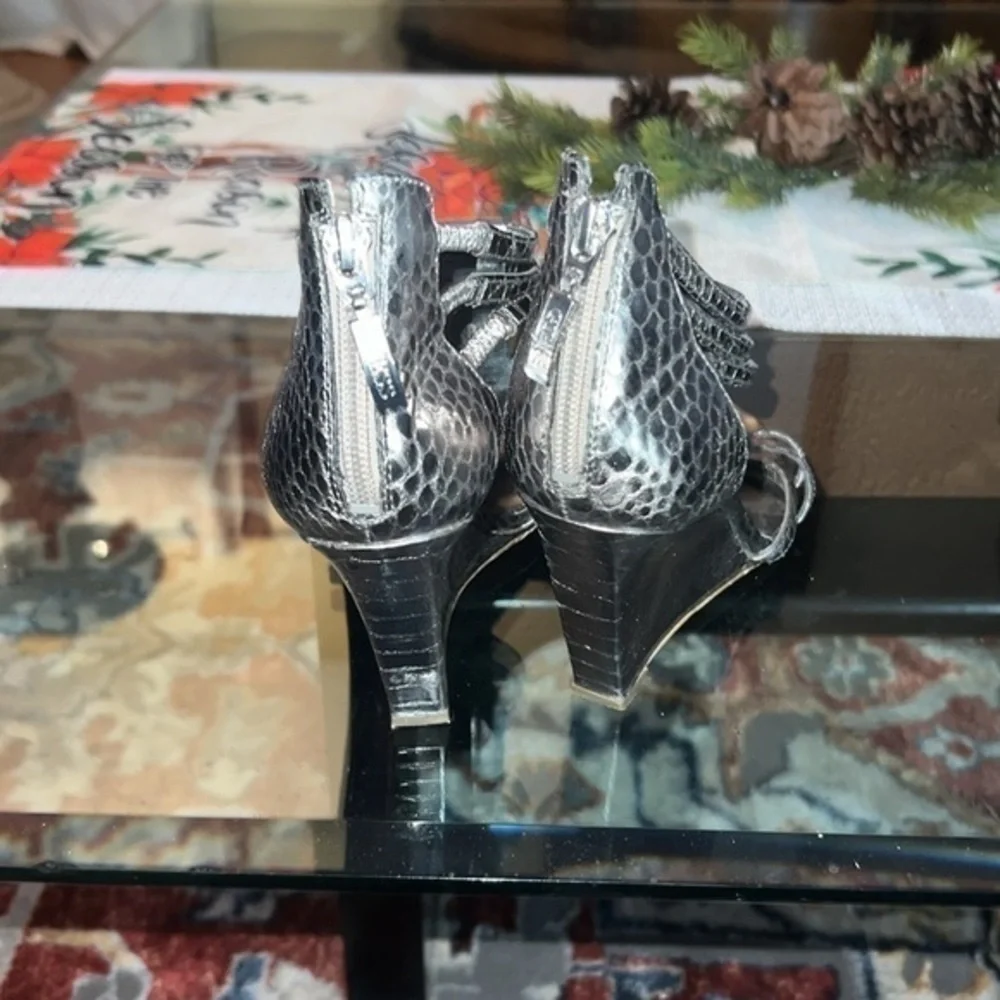 Guess heels about to 4inches, big rhinestones , bright and shiny